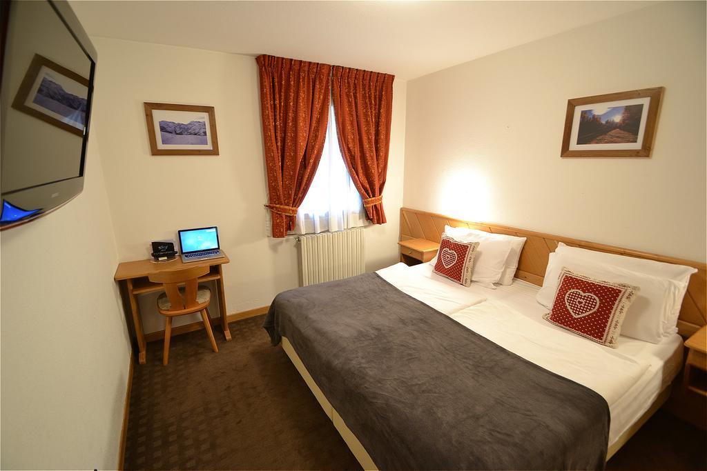 Hotel Piccolo Tibet Лівіньо Номер фото